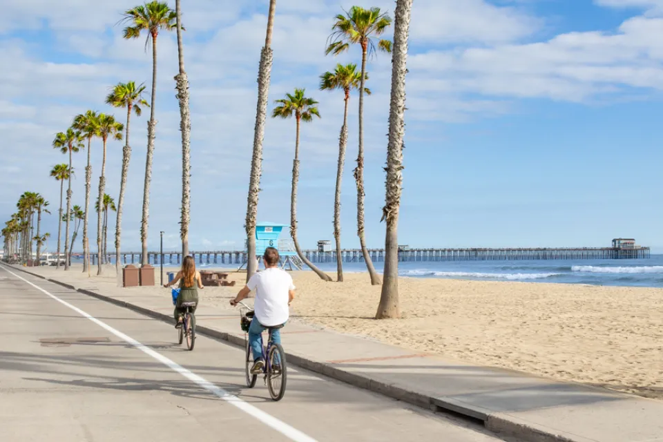 Two people on bikes in San Diego, California